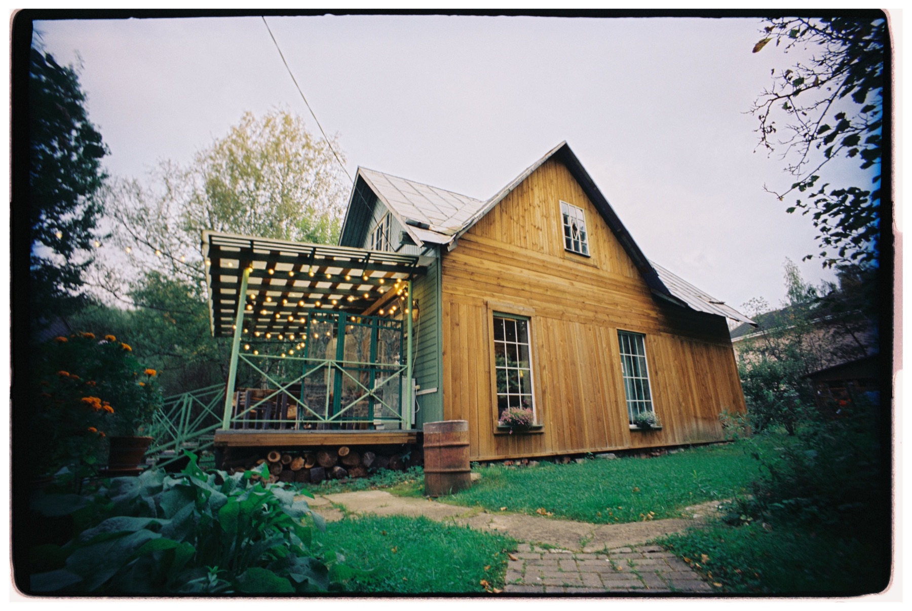 A welcoming home surrounded by a leafy garden